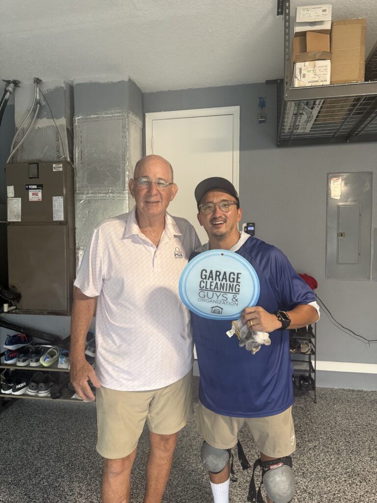 Finished garage in Palm Beach, FL with polyaspartic floor coating, custom cabinets, and overhead storage racks installed by Garage Cleaning Guys & Organization