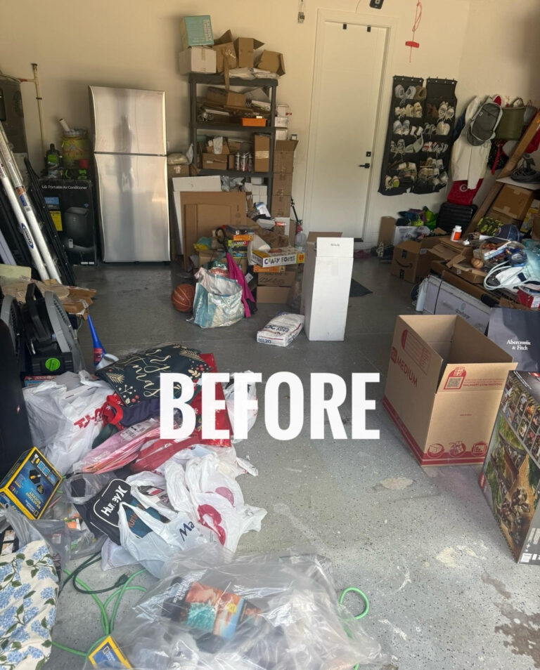 Cluttered garage in Boca Raton before garage makeover with boxes tools and disorganized storage